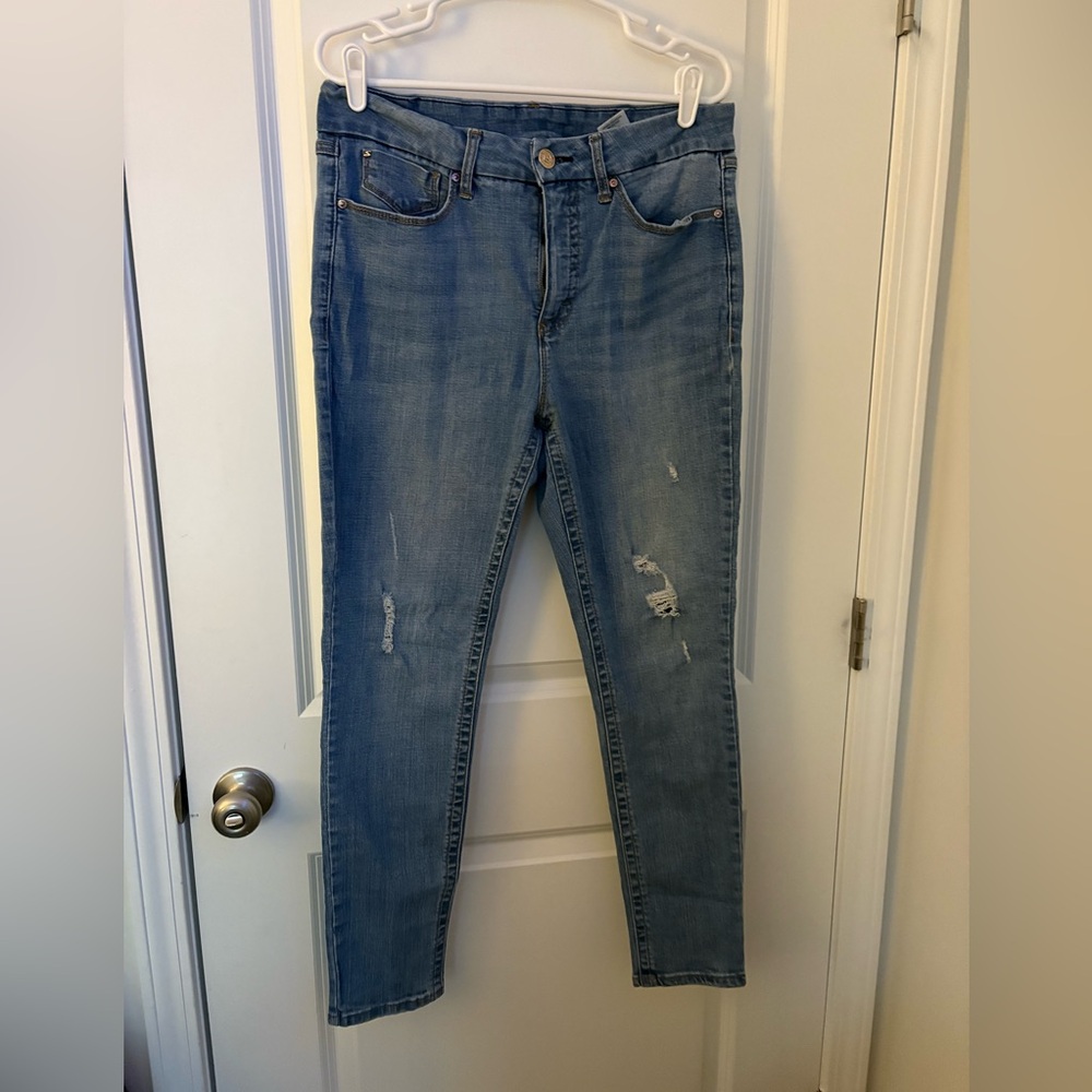 Medium wash Seven7 jeans with distressing